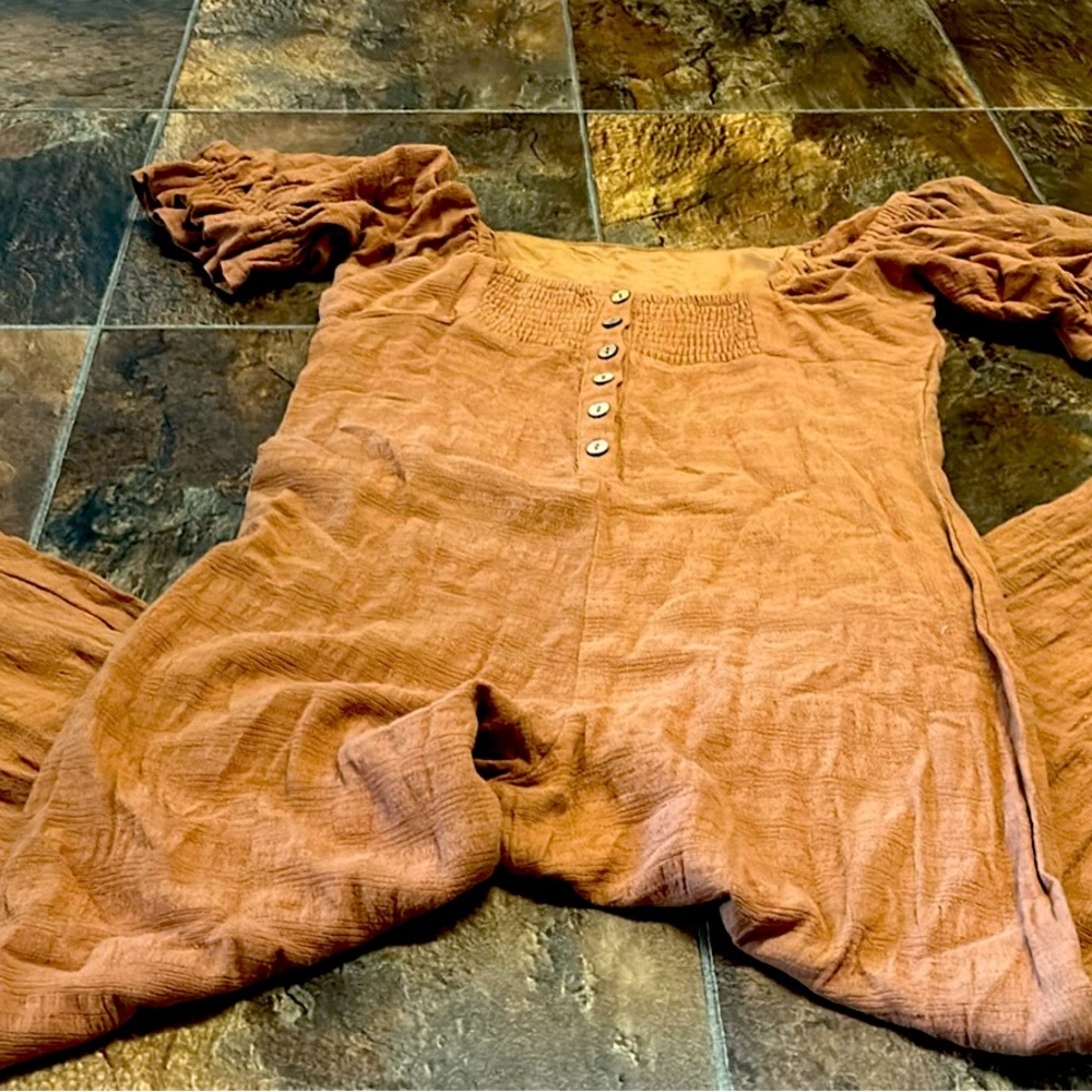 Two jumpsuits